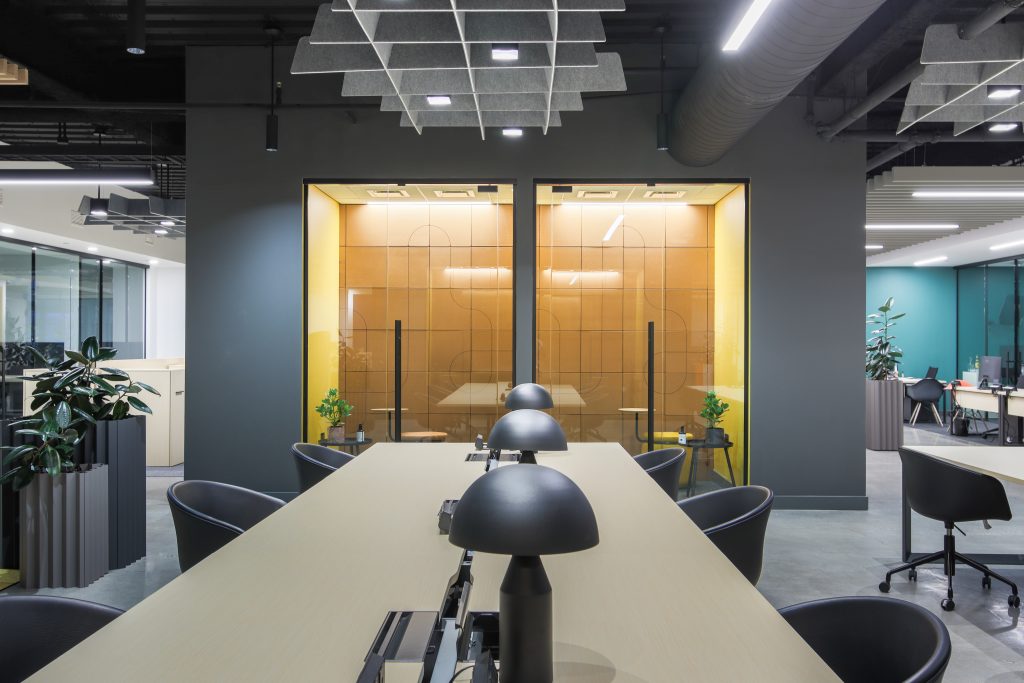Open office space and phone booths at Colab in Bell Works.