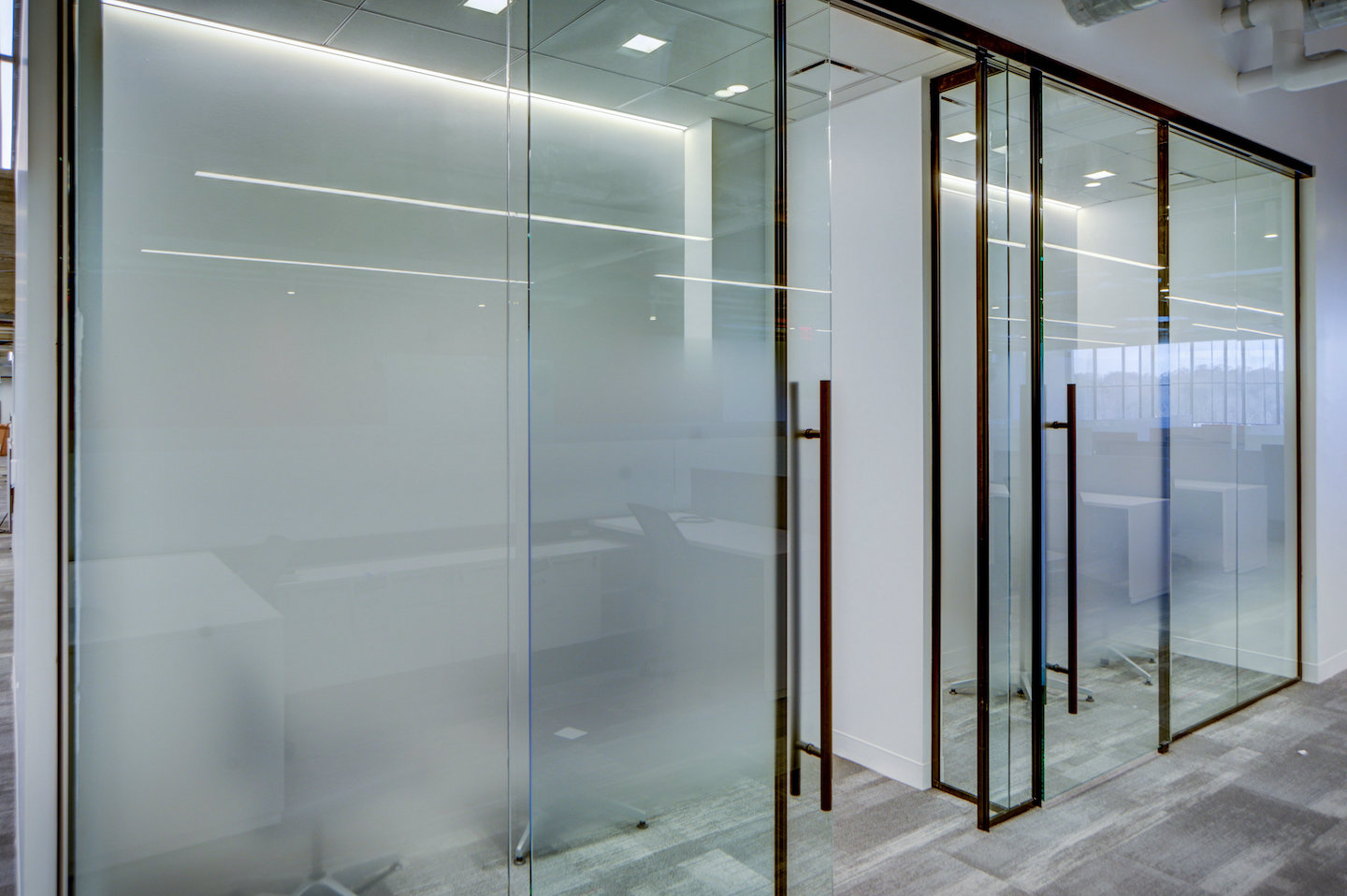 Sliding Doors vs. Hinged Doors in the Office - MetroWall