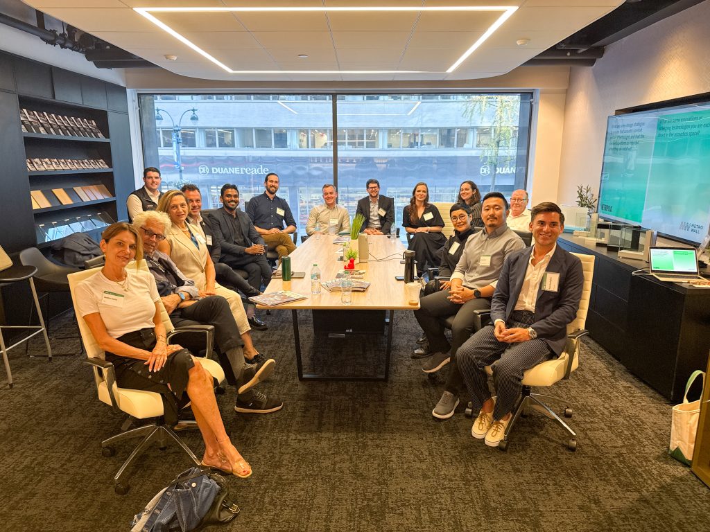 Group photo of acoustic experts at MetroWall showroom for panel. 