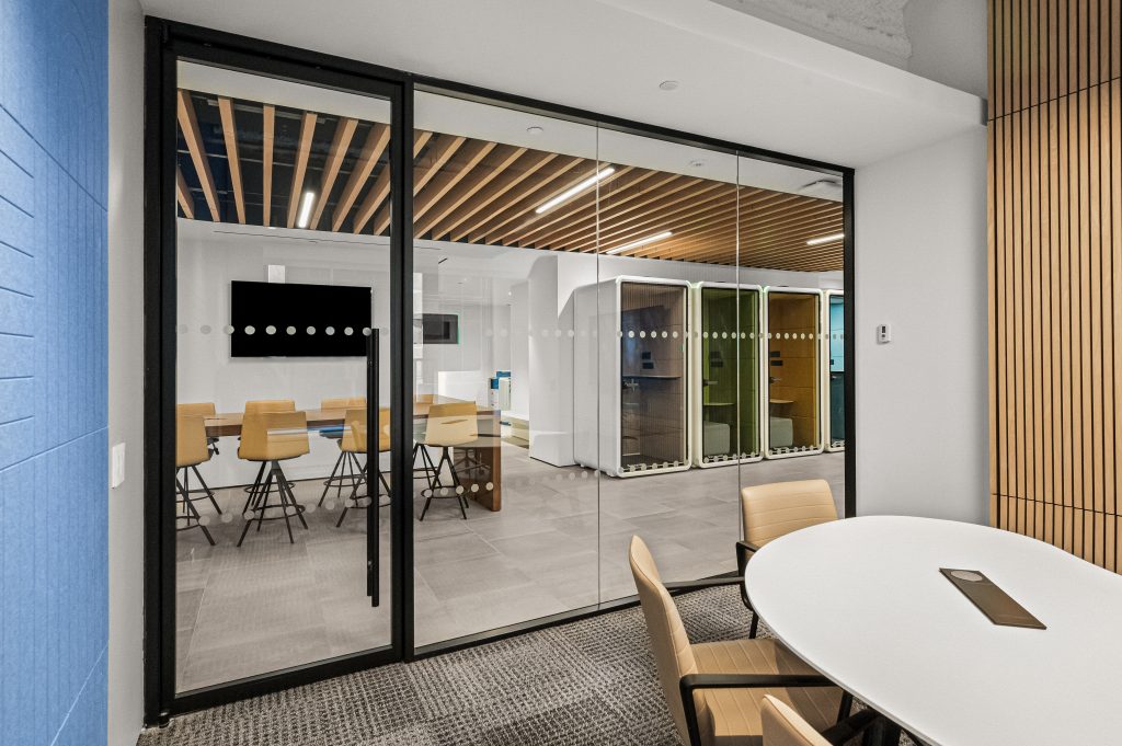 Inside-out-view-of-meeting-room-with-HUSH-and-wood-paneling-scaled
